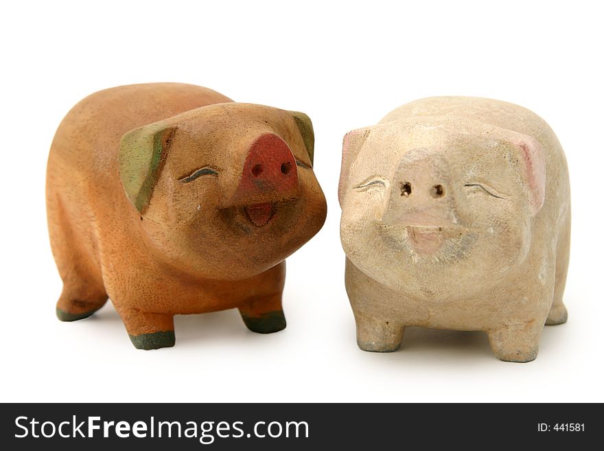Cheerful and decorative piggy wood carvings for interiors or as gifts. Cheerful and decorative piggy wood carvings for interiors or as gifts