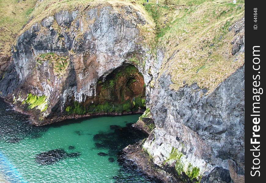 Green sea at the mouth of a cave. Green sea at the mouth of a cave