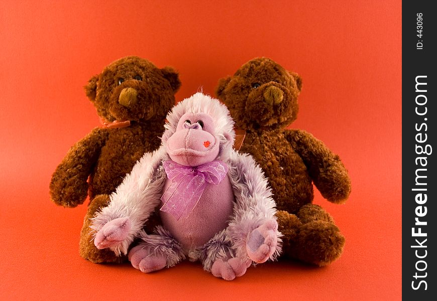 Three stuffed animals on a red background just in time for Valentine's Day. Three stuffed animals on a red background just in time for Valentine's Day.