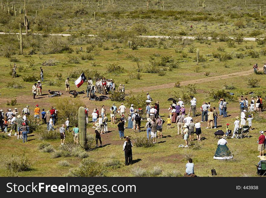 Spectators and participants in a civil war battle enactment. Spectators and participants in a civil war battle enactment.