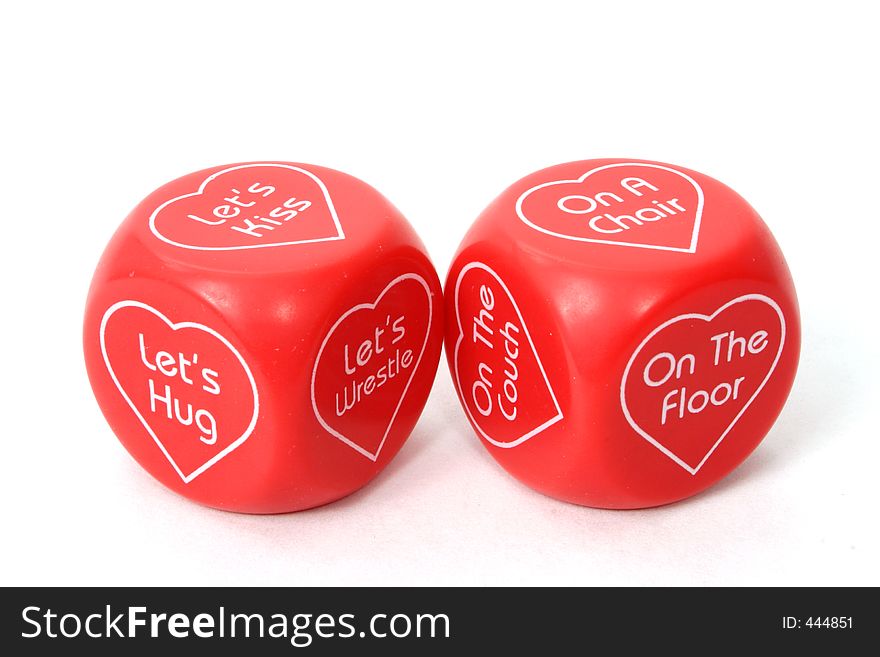 A pair of dice with love games, valentine theme. A pair of dice with love games, valentine theme