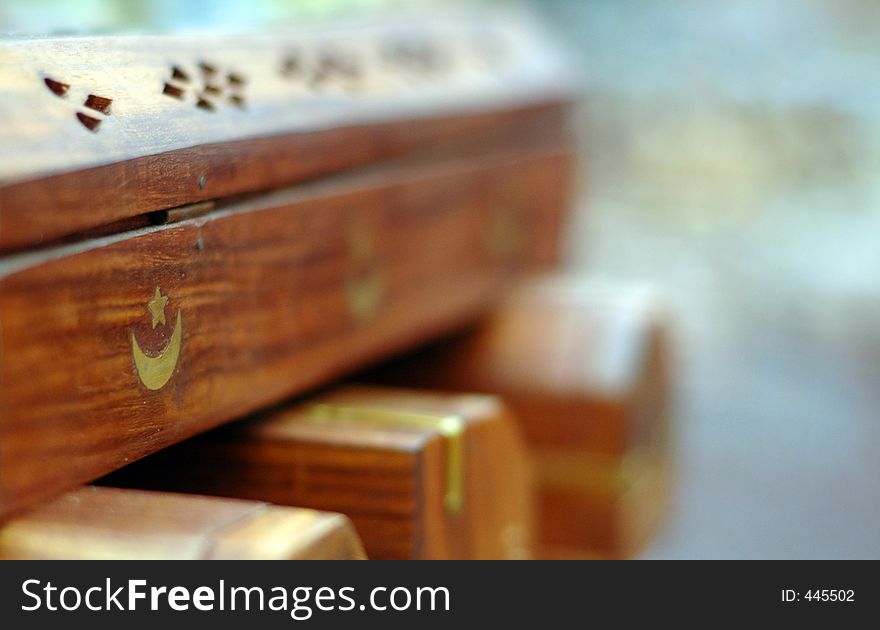 Wooden boxes stacked criss-cross on top of each other