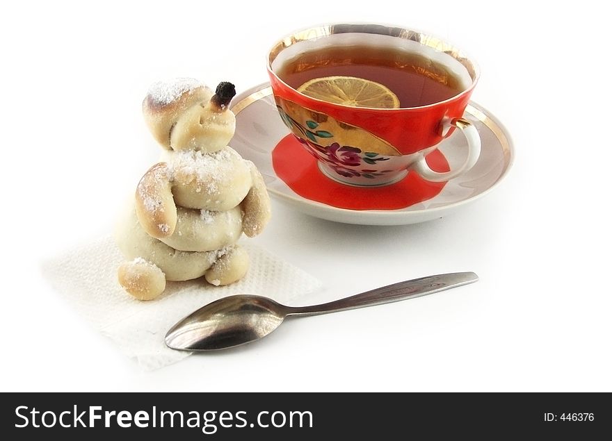 Snowman with cap of tea