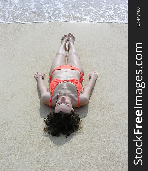 Girl Lies On Beach