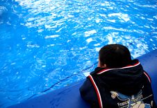 A Chinese Boy And Blue Water Stock Image A Chinese Boy And Blue Water Stock Image