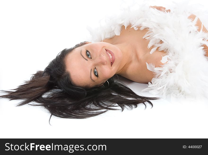 Portrait of the brunette with blue eye on white background