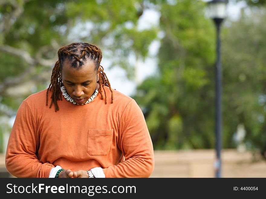 Man outreaching his hands. Blurry Background. Man outreaching his hands. Blurry Background.