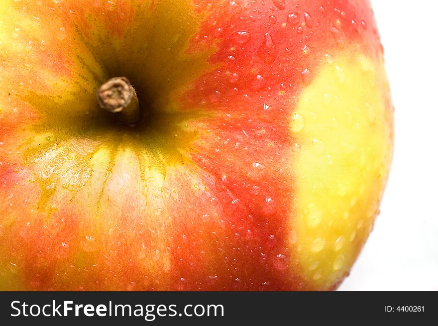 Part of a fresh wet apple on white background