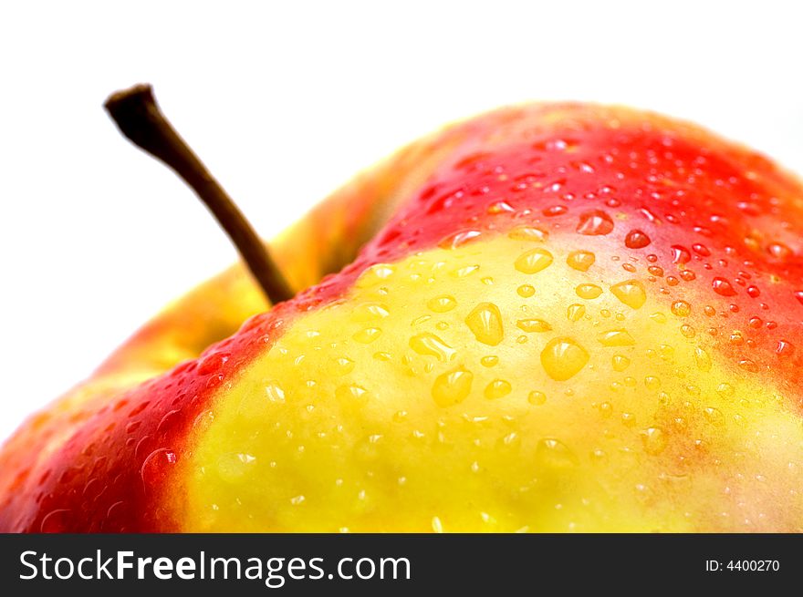 Part of a fresh wet apple on white background