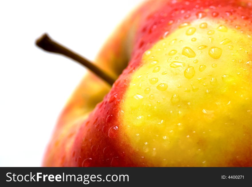 Part of a fresh wet apple on white background