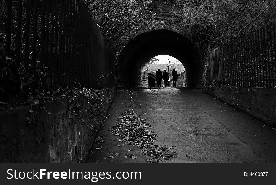 Three people in tunnel(Vysehrad Castle,Prague). Three people in tunnel(Vysehrad Castle,Prague)