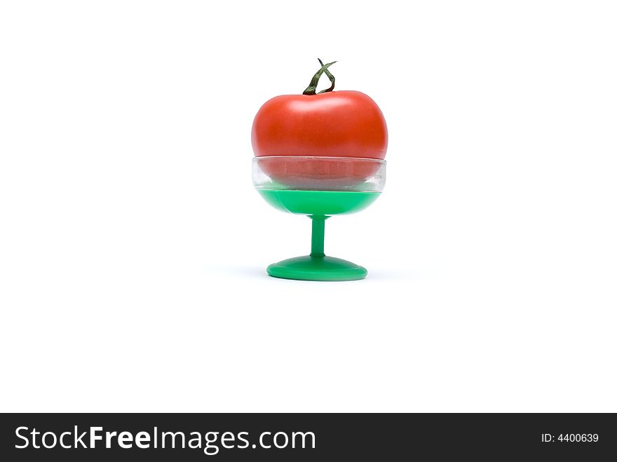 Juicy Isolated Tomato On A Green Suppot