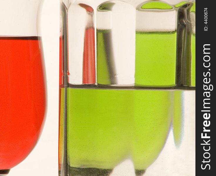 Composition from glasses with multi-coloured drinks