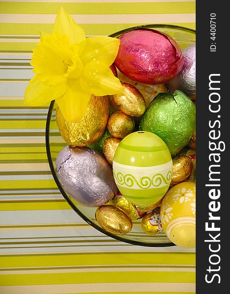 Easter eggs in bowl and flower. Easter eggs in bowl and flower