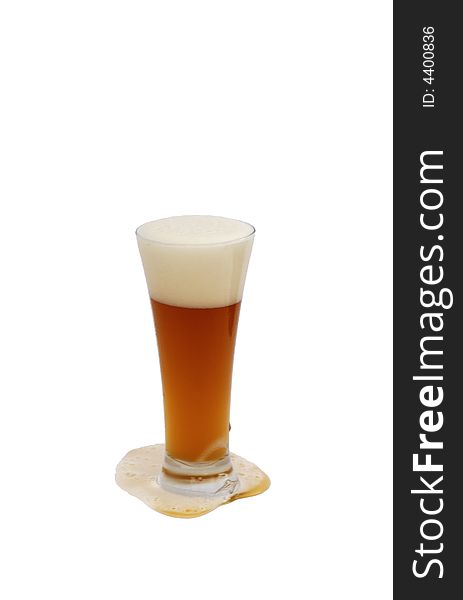 Glass of honey brewed wheat beer on white. Glass of honey brewed wheat beer on white