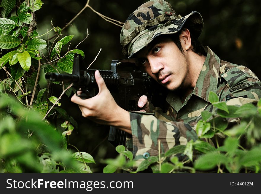 Soldier taking aim for shot