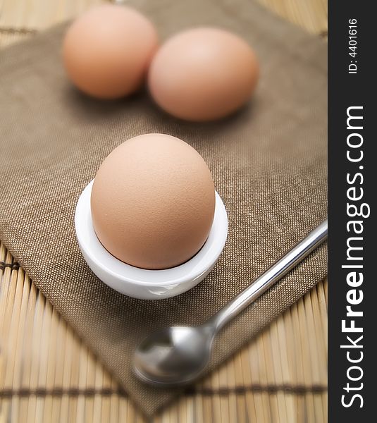 Close-up of an egg in an eggcup. Close-up of an egg in an eggcup