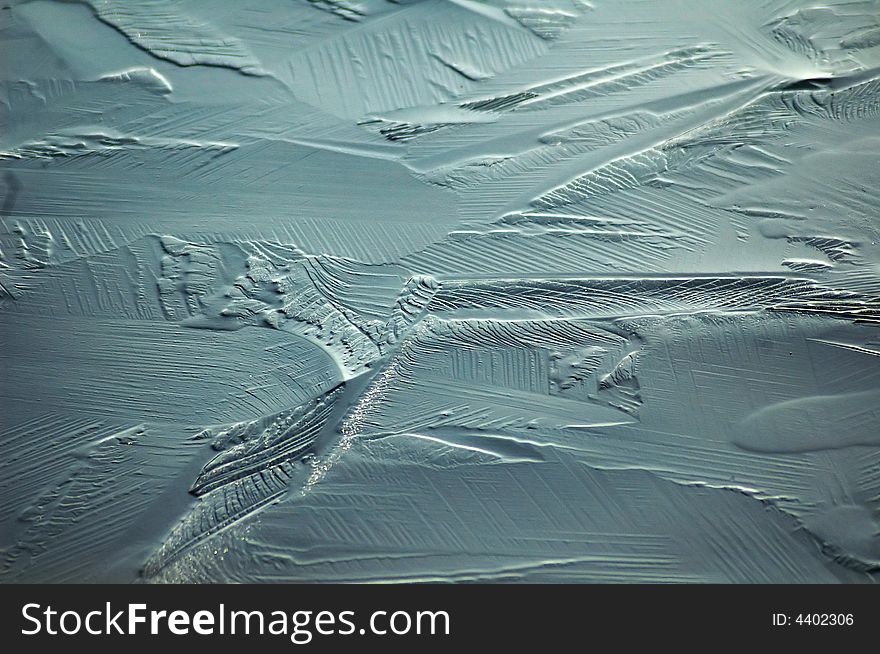 Ice patterns formed on a frozen loch