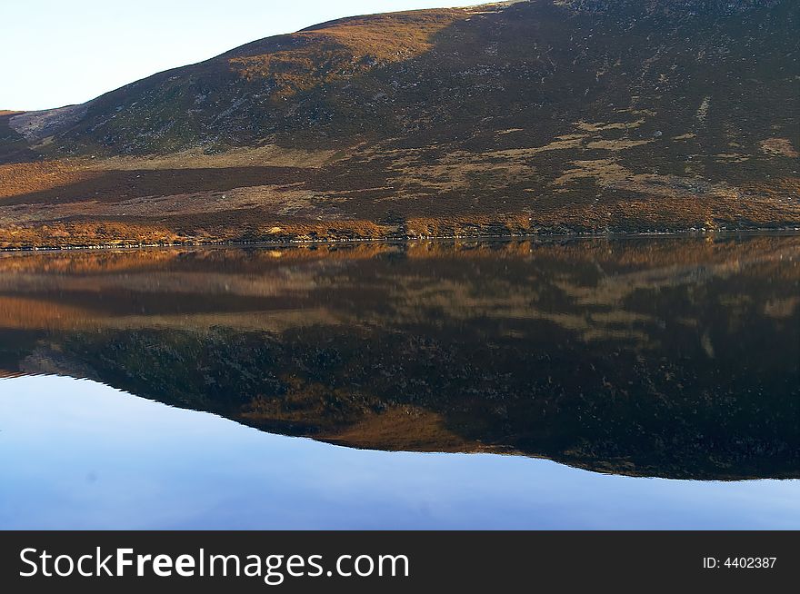 Reflection of the hills in the water of loch lee