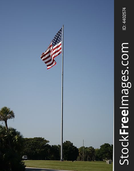 The American Flag flies proudly over Ft. DeSoto on Mullet Key in Tampa Bay, Florida