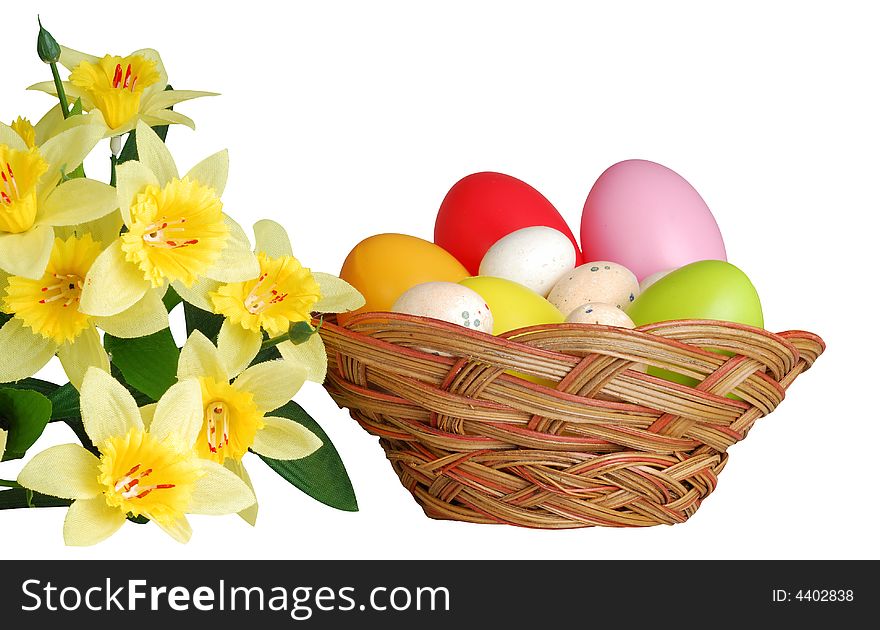 Easter basket and daffodil isolated on white background