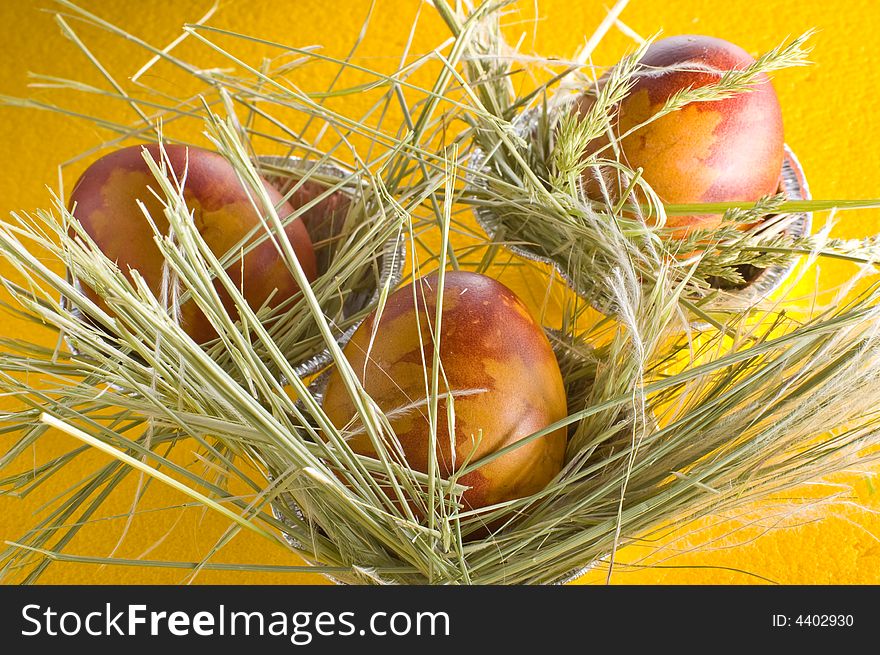 Easter eggs on yellow background