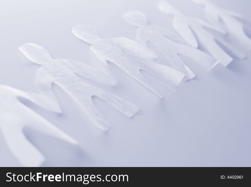 Paper people on white background