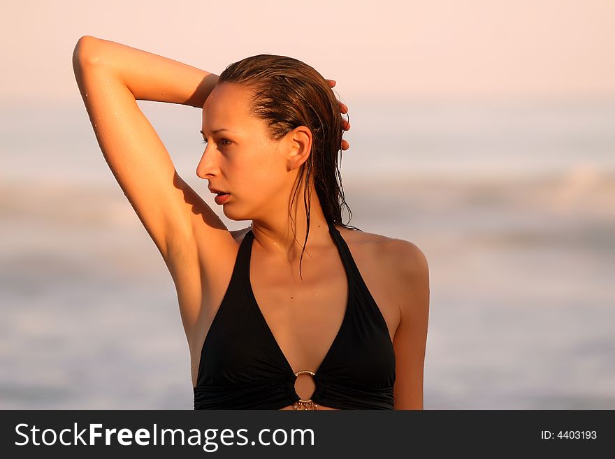 Woman posing at the beach in caribbean