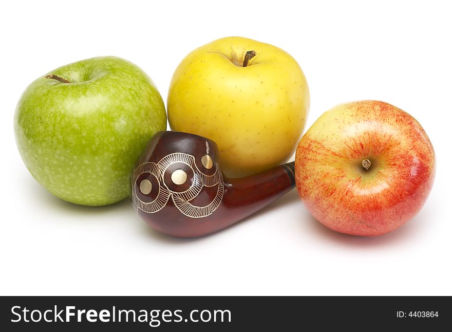 Long ornamented north-caucasian pipe with multicolored apples at white background. Long ornamented north-caucasian pipe with multicolored apples at white background