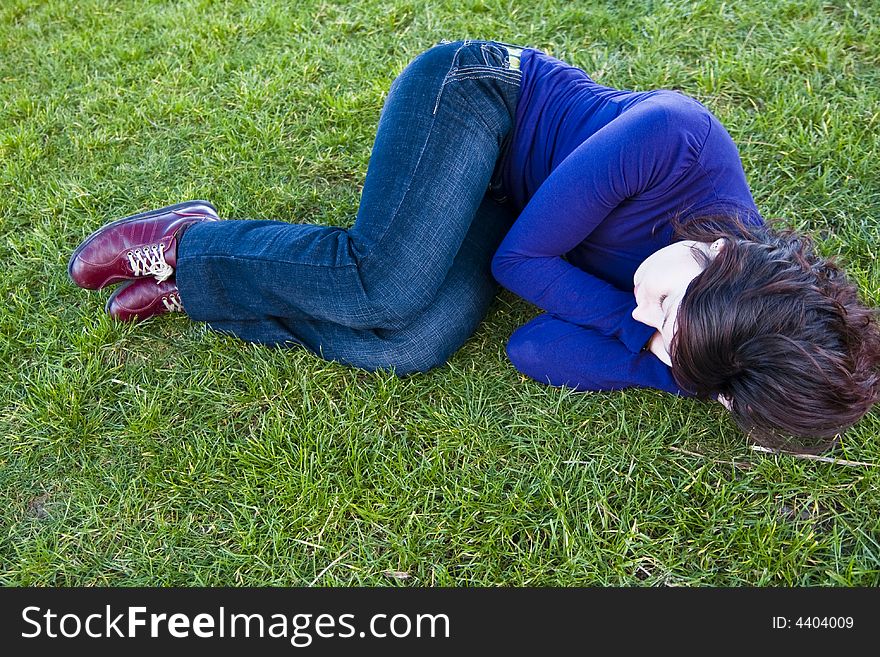 Young Woman On The Grass