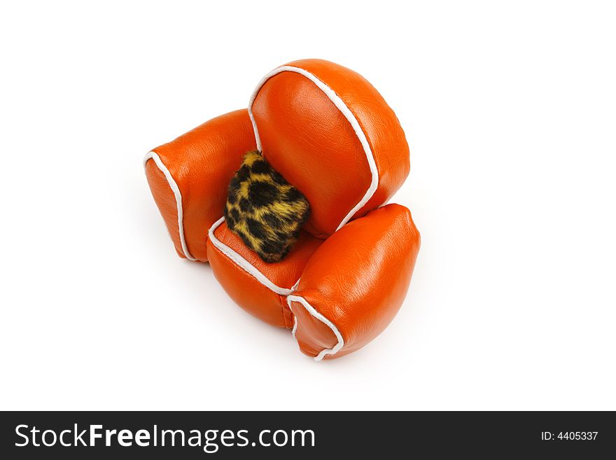 Orange chair on white, fur cushion