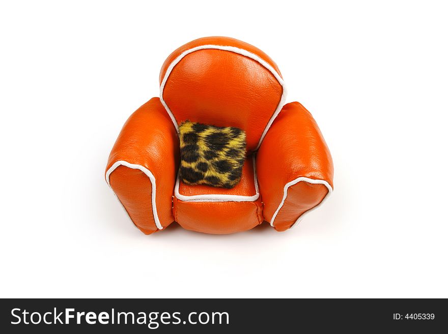 Orange chair on white, fur cushion. Orange chair on white, fur cushion
