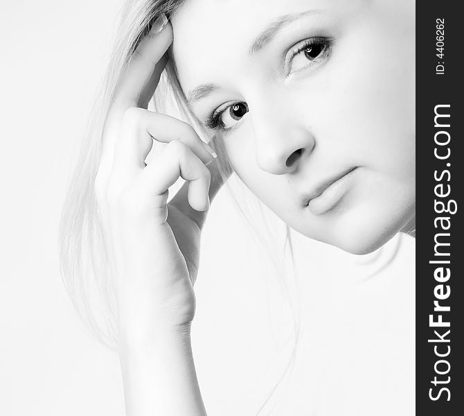 Young girl in a dress in the studio on a white background. Young girl in a dress in the studio on a white background.