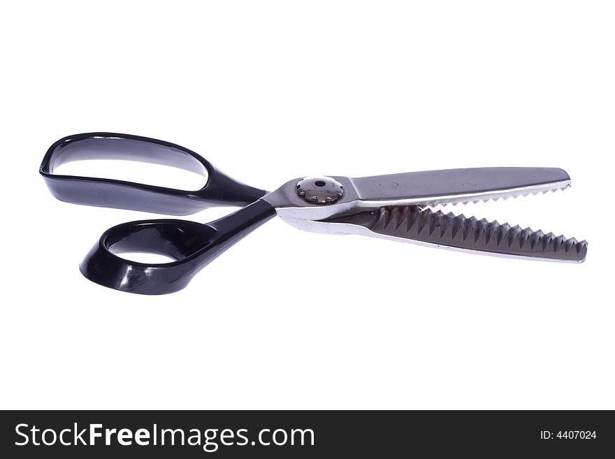 Tailor's scissors on a white background