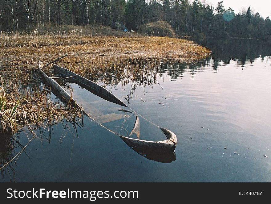 Sunken boat in a river