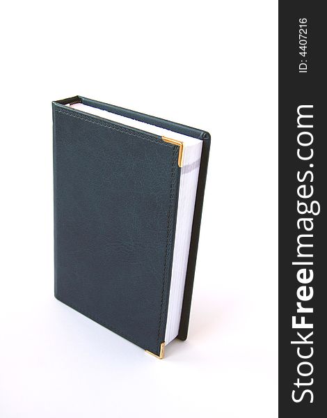 Blue material notebook isolated on white. Blue material notebook isolated on white.