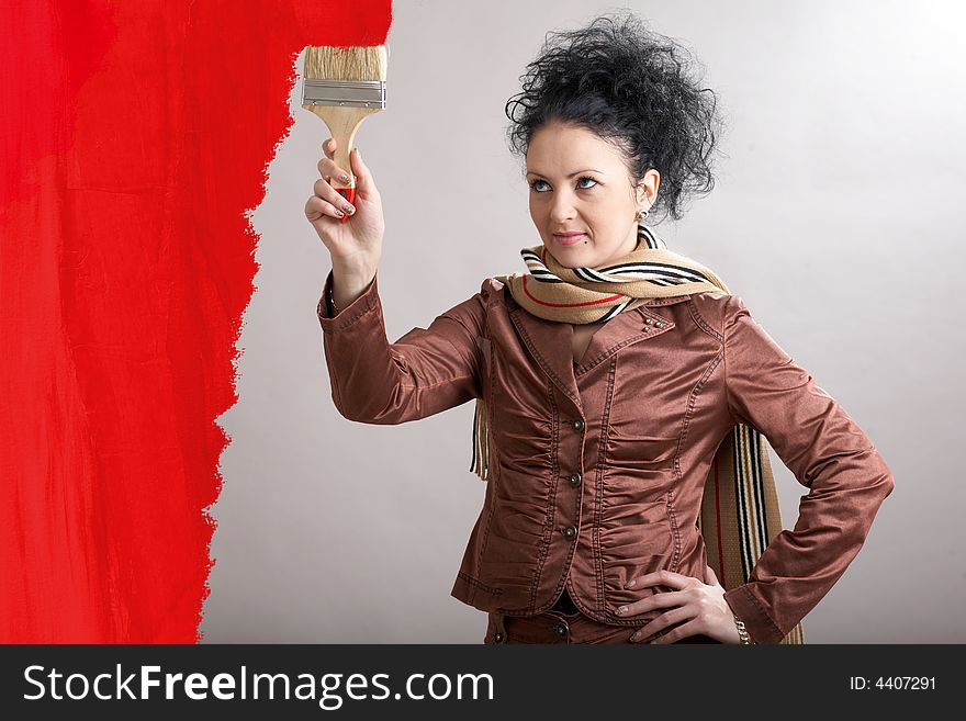 An image a girl painting red area