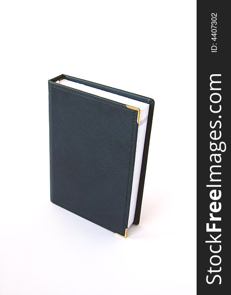 Blue material notebook isolated on white. Blue material notebook isolated on white.