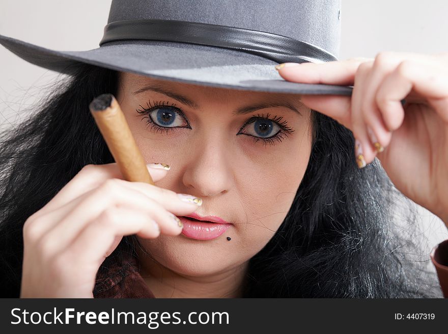 An image of a girl in felt hat