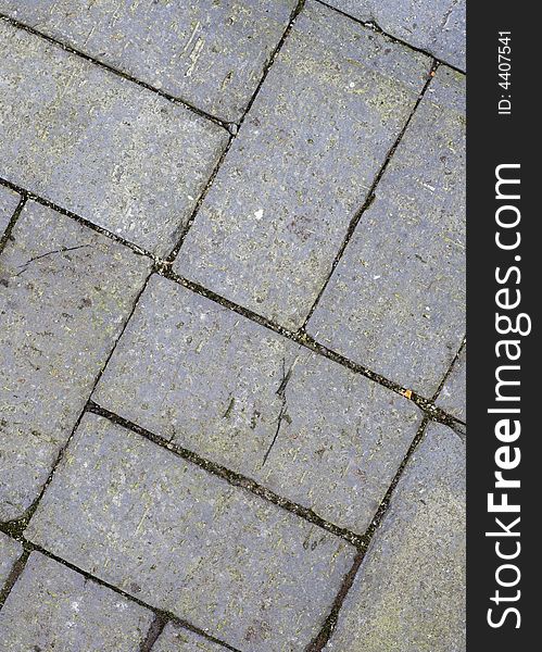 Detail of well-used block paving.