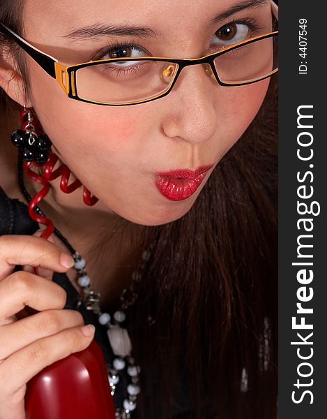 Woman on the phone wearing an eyeglasses