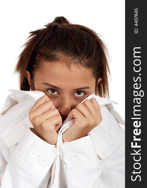 Young woman covering her face with jacket