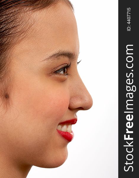 Side view of a cheerful young girl. Side view of a cheerful young girl