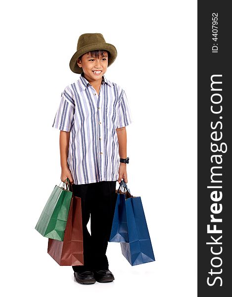 Happy young boy on a shopping spree