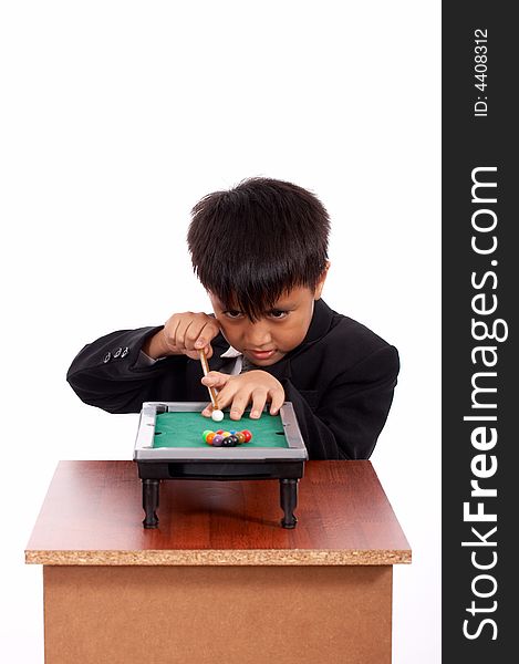 Young man playing billiards in black suit