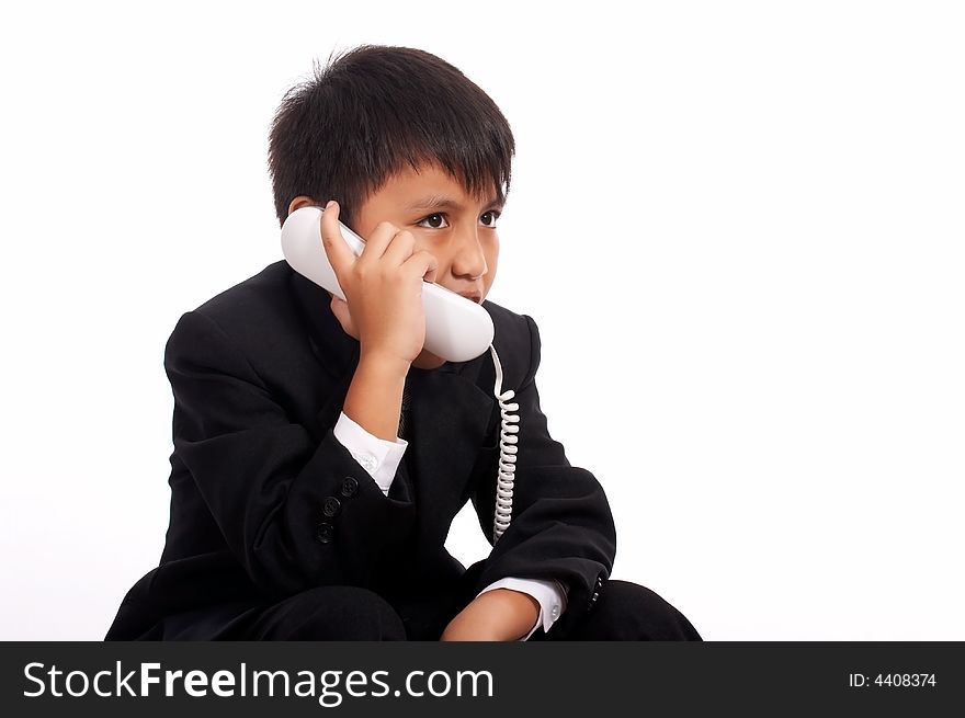 Handsome young businessman talking on the phone