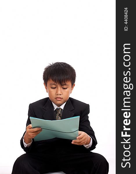 Handsome young teacher sitting - holding blue folder