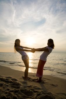 Two Girls Having Fun At The Beach Stock Photos Two Girls Having Fun At The Beach Stock Photos