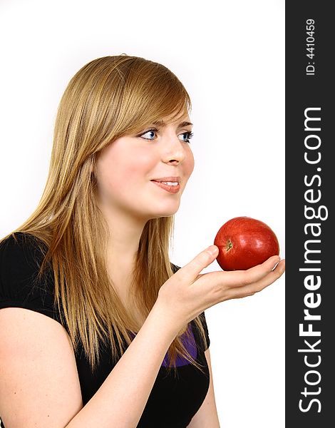 Beautiful young woman holding a apple