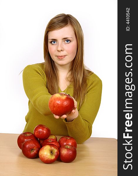 Beautiful young woman holding a apple